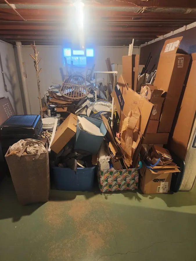 Roll-off dumpster container at job site for 15 Yard Dumpster Rental in Port Washington